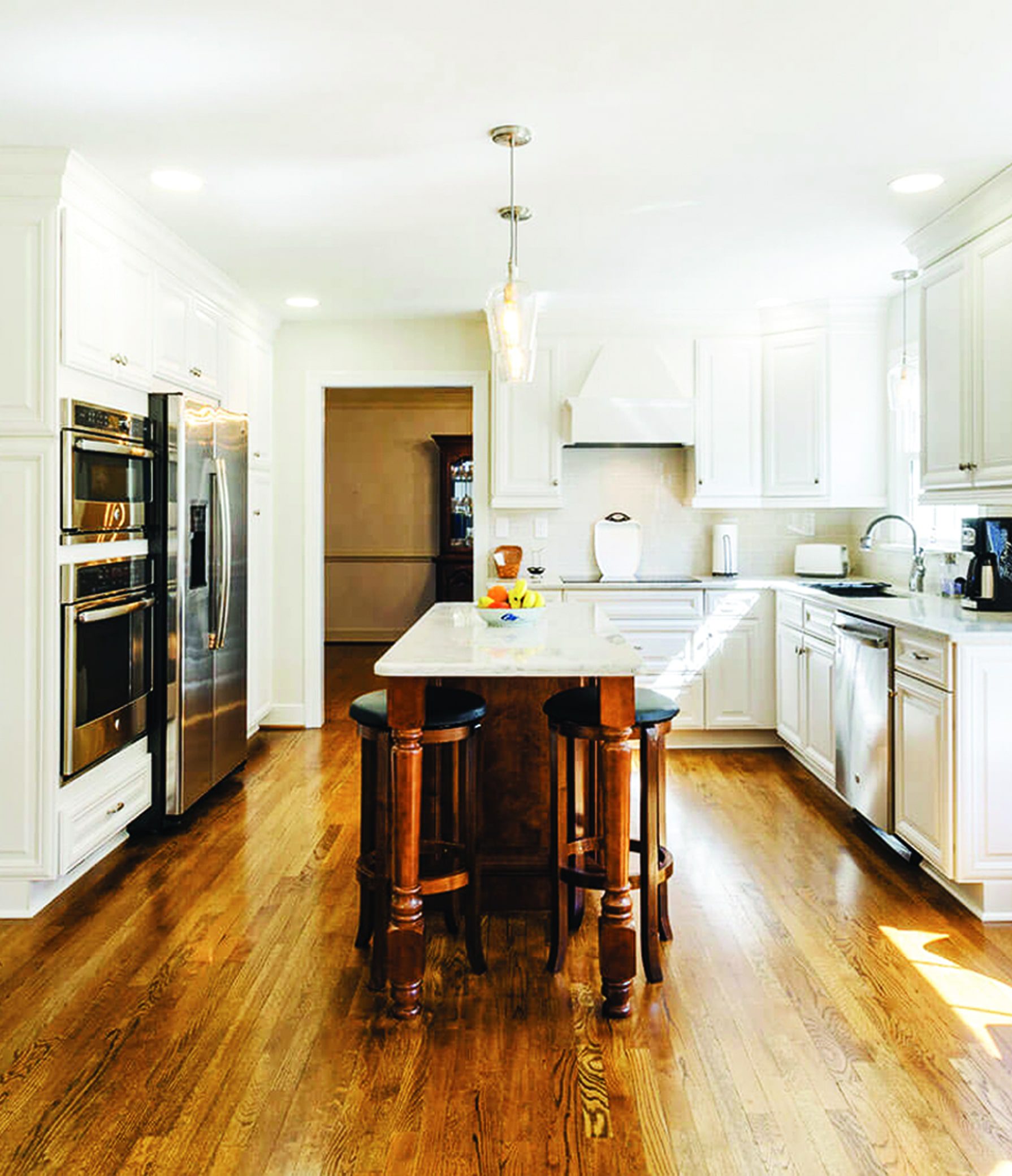 white kitchen with warm woods